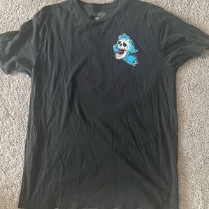 RIOT SOCIETY SKULL IN HAND GRAPHIC TEE